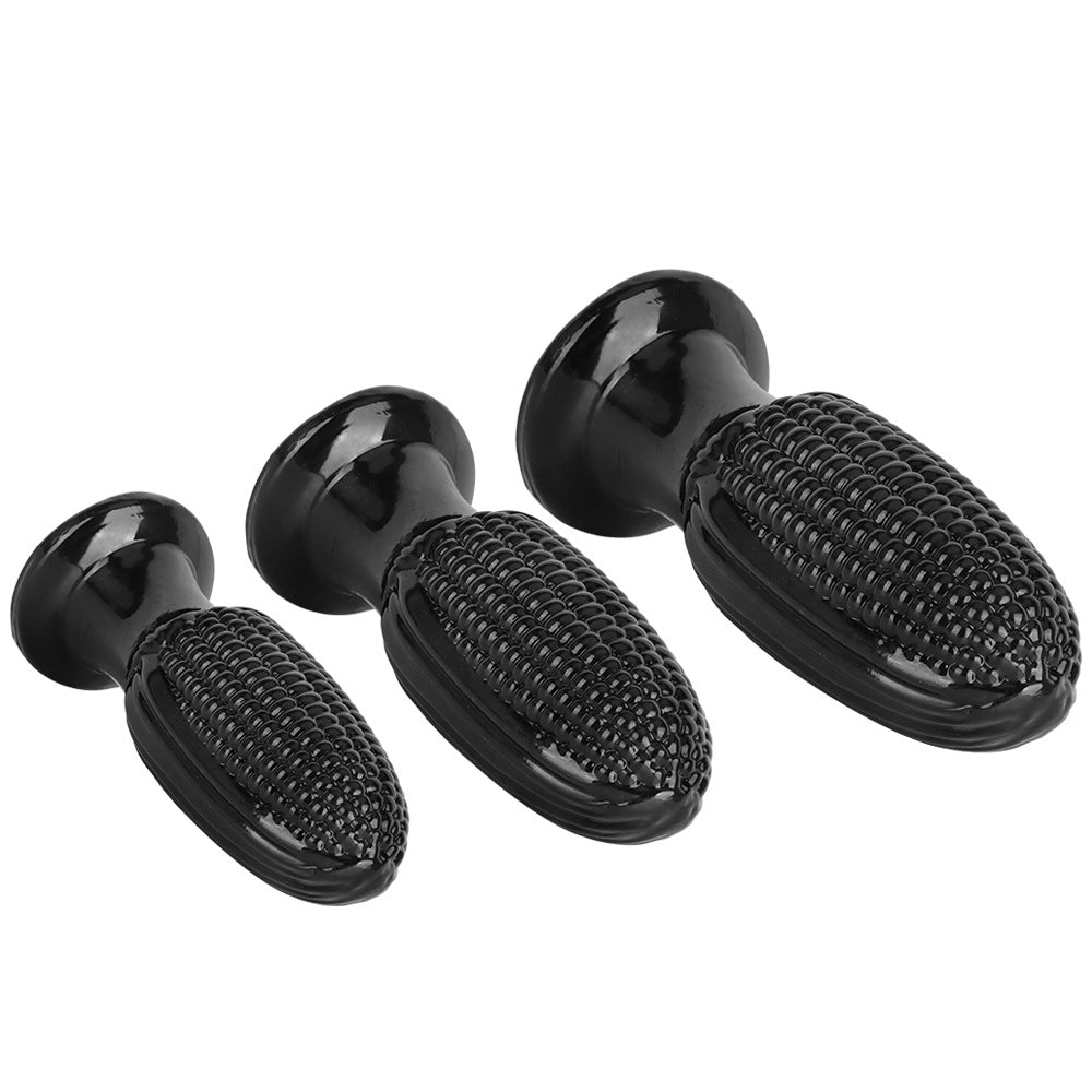 Zwarte PVC Maïskolf Buttplug In Drie Maten